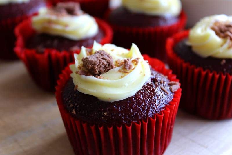 Red Velvet Cupcakes with Frosting and Flakes